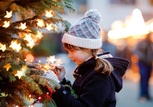 little kid having fun on traditional Christmas