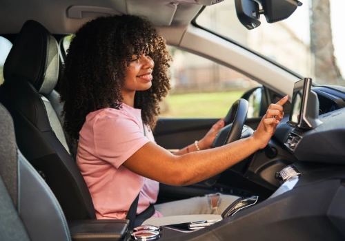 young woman setting navigation system