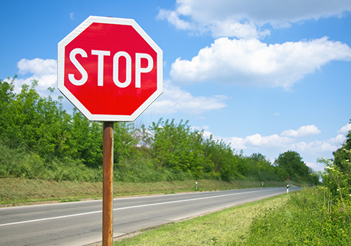 stop sign on an empty road