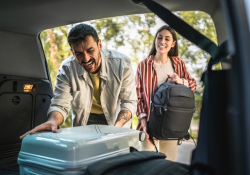 happy family travelling by car