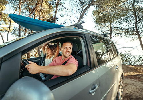 Couple travelling with the help of a car GPS