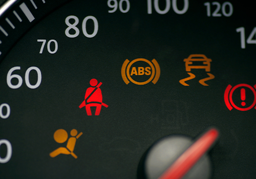 Car dashboard lights illuminated