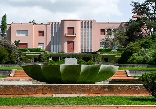 Interior of the National Azulejo Museum in Lisbon, featuring historic tile panels and the staircase of the former convent.
