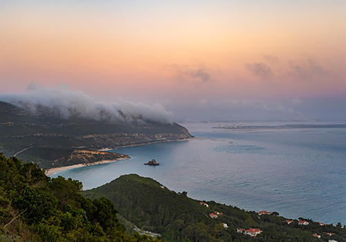 View over the coast of Arrábida Natural Park at twilight