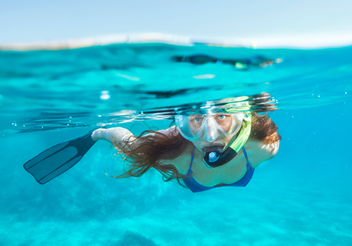 Woman snorkelling underwater