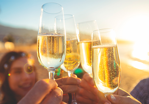 Toast with friends to New Year's Eve in Portugal, Algarve